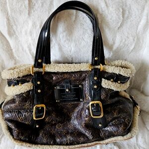 Louis Vuitton Inventeur Bag